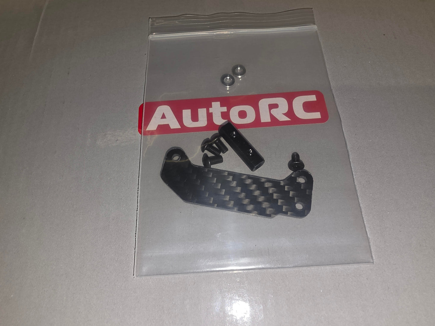 #AU03719 OP CARBON SERVO HOLDER